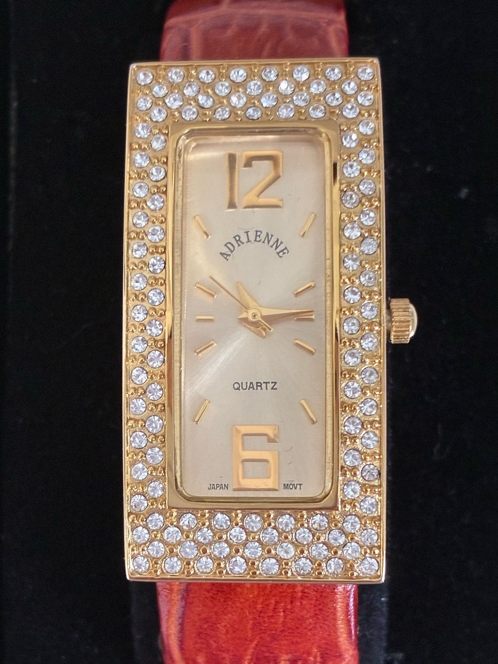 Adrienne Real Collections Gold Tone Crystal Studded Watch, Red Bangle Band - New